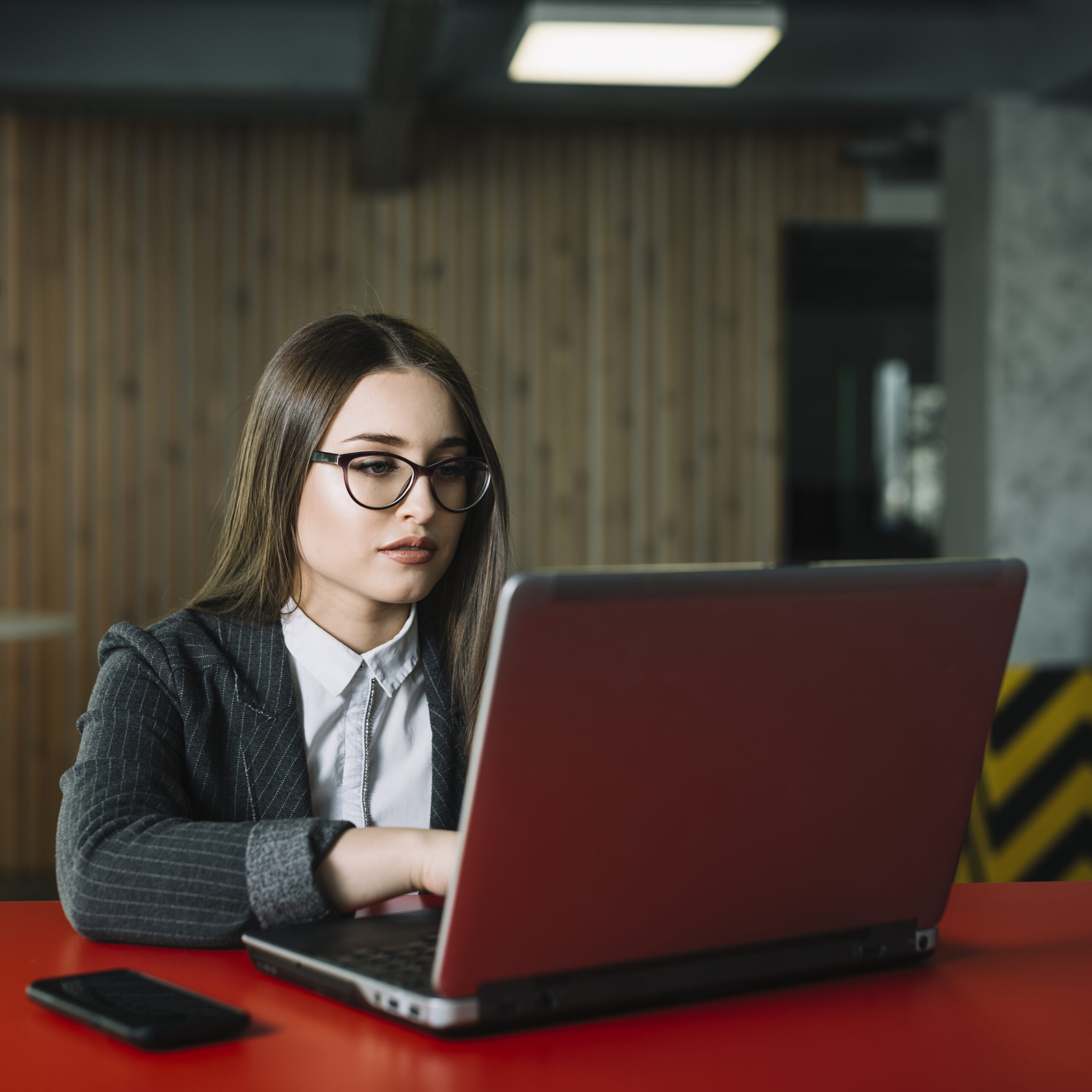 business-woman-using-laptop-table